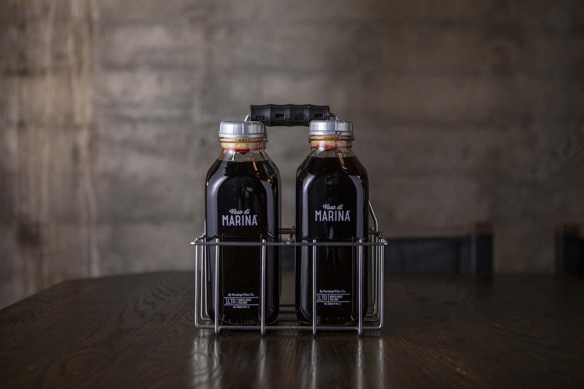 Portalupi Vaso di Marina Rosso bottles on table